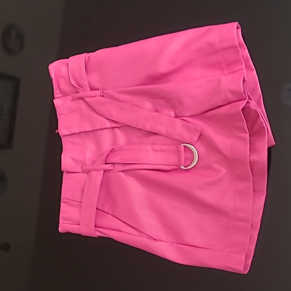 Pink leather shorts